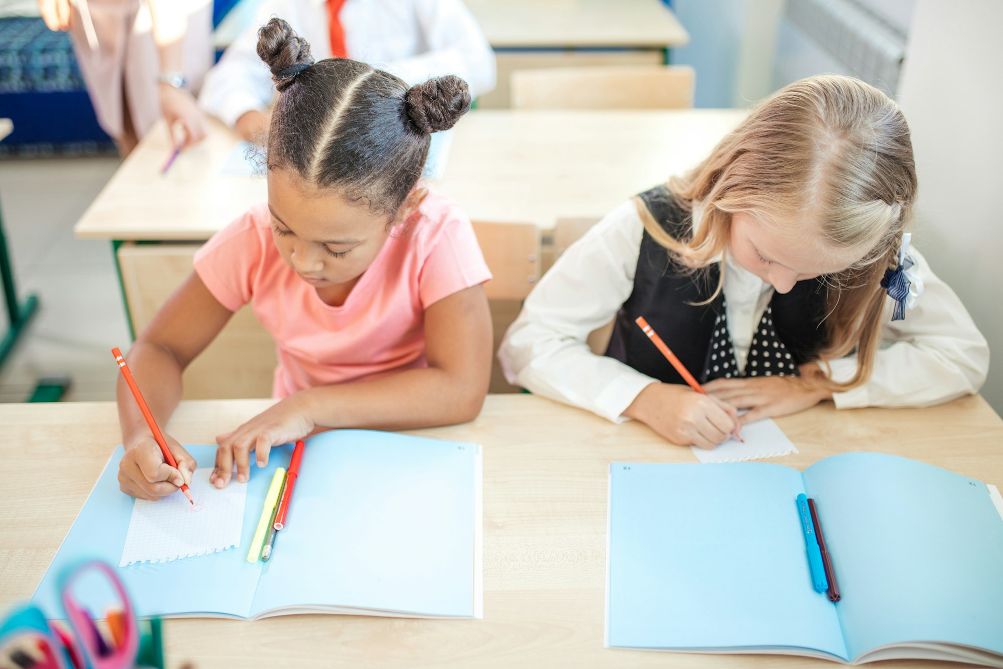 school children are participating actively in class. Education, homework concept